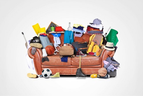 Furniture clearance professionals removing items from a Balham home