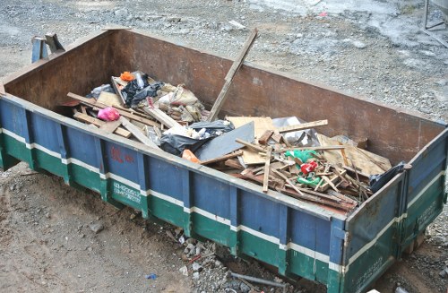 Crew unloading green waste in Balham garden clearance
